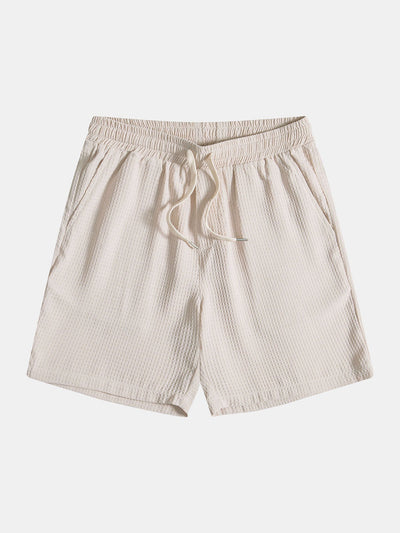 Waffel-Poloshirt mit Tasche und Waffel-Shorts.